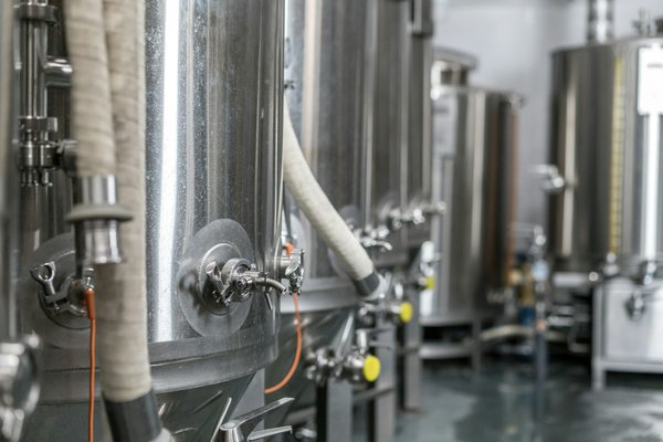 What are the best UK cities for learning about the history of British brewing through guided tours?